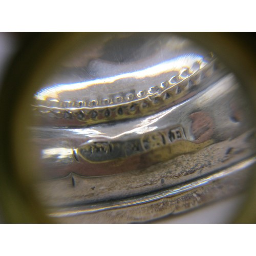 235 - A pair of weighted sterling silver stub candlesticks, hallmarked for Birmingham 1929, various marks ... 