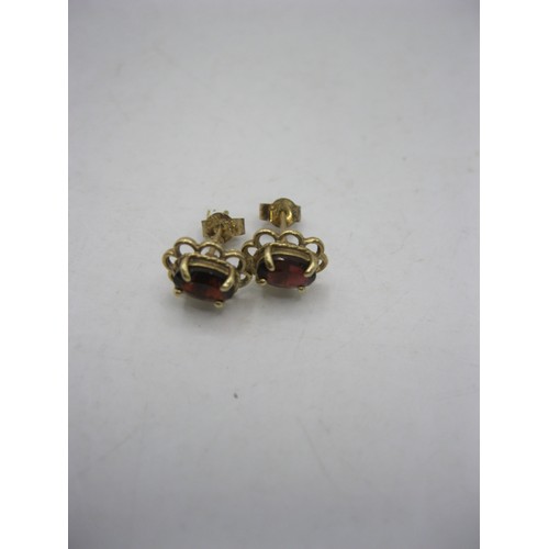 239 - 3 pairs of 9 carat gold earrings: 1 pair ball studs, 1 pair set with pearls and one pair with red st... 