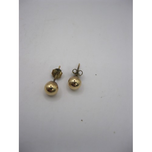 239 - 3 pairs of 9 carat gold earrings: 1 pair ball studs, 1 pair set with pearls and one pair with red st... 