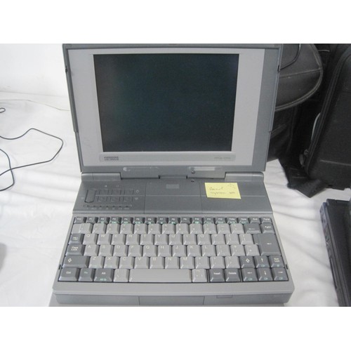 276 - 4 vintage laptops, 3 with likely 486 processors, one Pentium II, comprising a Toshiba Satellite Pro ... 