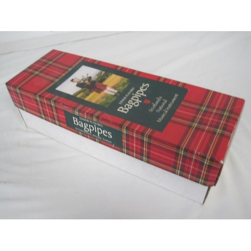 278 - A boxed set of junior bagpipes in good order, have your kids play lovely soothing bagpipe music for ... 