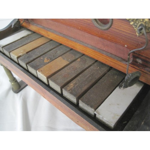 283 - An antique childs piano with glockenspiel inside, for restoration