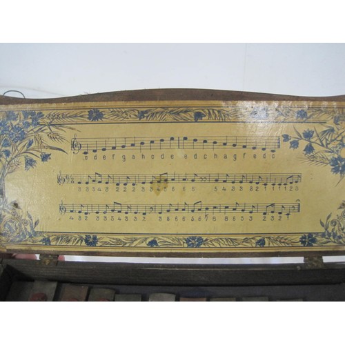 283 - An antique childs piano with glockenspiel inside, for restoration