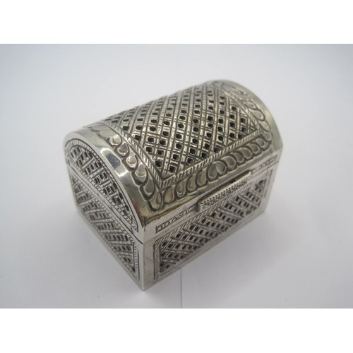 202 - A white metal pot pourri box modelled as a domed chest with hinged lid, pierced to top and sides, th... 