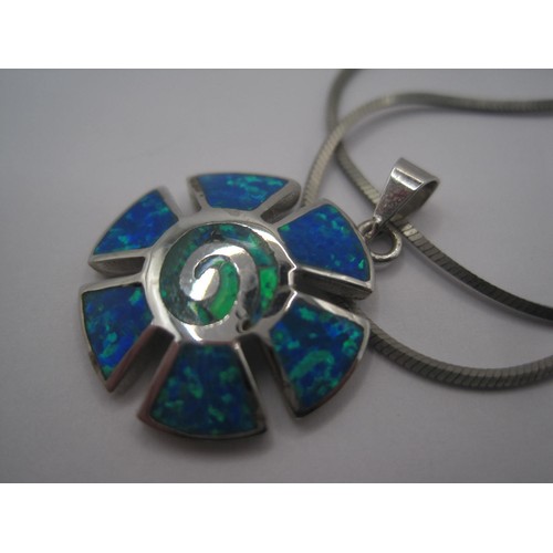 207 - A 925 silver and blue-green enamel pendant on chain, matched with a pair of earrings set with green ... 