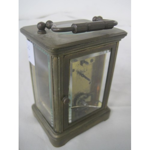 20 - A brass Wilson & Sharp of Edinburgh carriage clock. A/f hairline to enamel, crack to back glazing, n... 