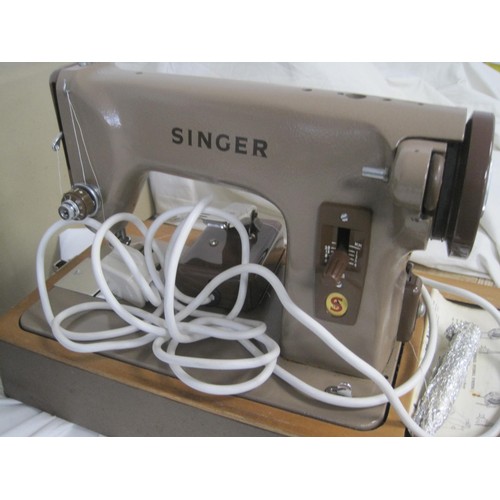 33 - Singer BZK 60-12 electric sewing machine in case, a vintage Singer manual sewing machine numbered P3... 