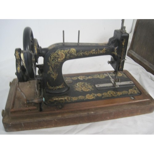 33 - Singer BZK 60-12 electric sewing machine in case, a vintage Singer manual sewing machine numbered P3... 