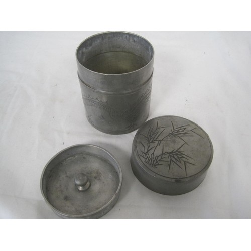 67 - A Kuthing Swatow Pewter pot with Oriental dragon design to sides and bamboo decor to lid, complete w... 