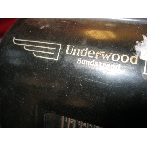 21 - A vintage Underwood Adding Machine with cover