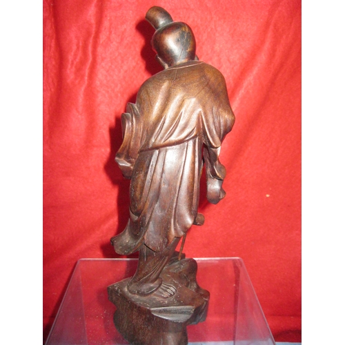 93 - A carved figure of an Oriental gentleman