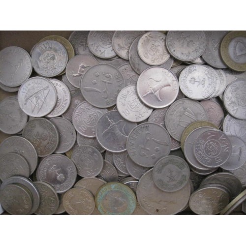 73 - A box of mixed Arabic coins, mainly silver (coloured, metallic composition unknown)