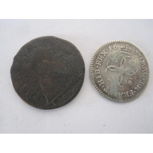 12 - A Charles II farthing and a Charles II 1677 silver threepence, the farthing showing considerable wea... 