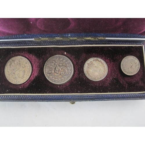 15 - A cased and dated 1878 Maundy Set box in blue with purple silk lined interior, with coins, but only ... 