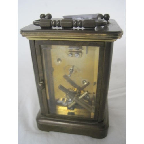 110 - Victorian Brass Carriage Clock in working order with key, together with a Mother of Pearl alarm cloc... 