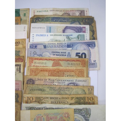 116 - About twenty-seven world banknotes including India, Belgium, South Africa, Pakistan, Bulgaria, Indon... 