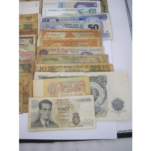 116 - About twenty-seven world banknotes including India, Belgium, South Africa, Pakistan, Bulgaria, Indon... 