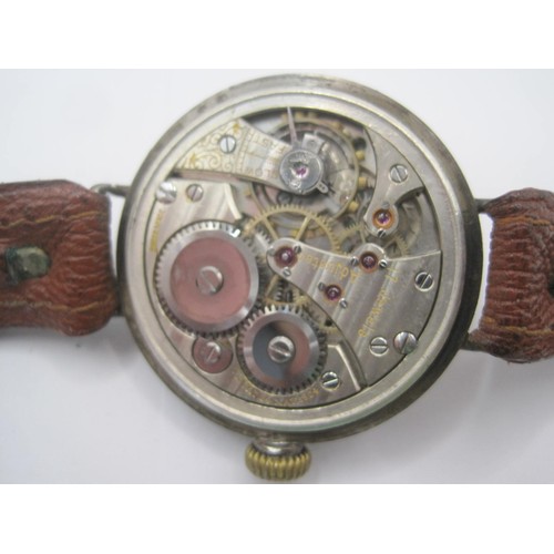 204 - A vintage trench watch, the mechanism likely a Cyma calibre 330/331, 17 jewels, Swiss made, in a ste... 