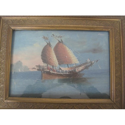 225 - A pair of framed and glazed Oriental paintings of ships, in good order, possibly on silk, of some ag... 