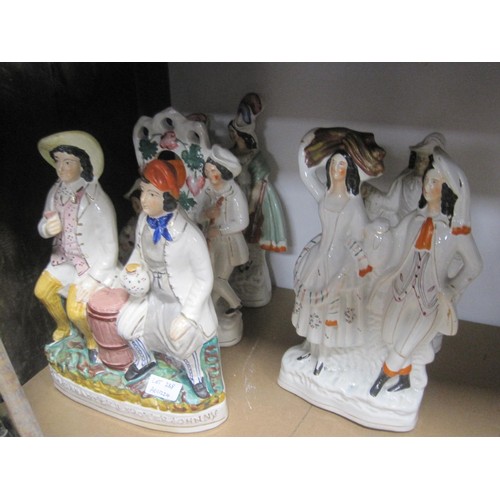 238 - Five Staffordshire flatback figures including Tam O' Shanter and Sooter Johnny, couple with flute an... 