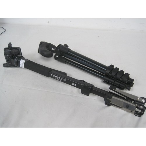 241 - A Manfrotto Compact Action tripod SN/T0655167 with hybrid head and soft carry case, and a Yunteng 28... 