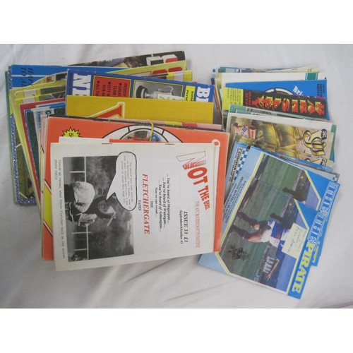 248 - A collection of about eighty-five football programmes and magazines, majority from the 1980s lower l... 