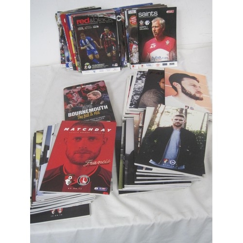 250 - A crate full of mainly Bournemouth AFC football programmes, plus some books on the same