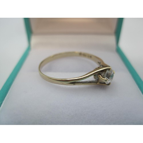 255 - A 9 carat gold cubic zirconia solitaire ring, ring size O, gross weight of ring approx. 1.3g, Britis... 