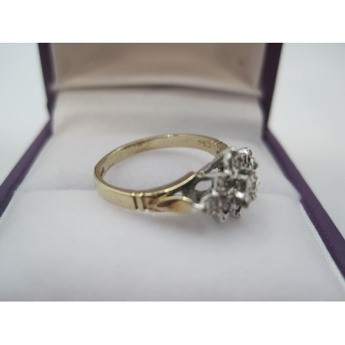 259 - 9 carat gold ring with a foliate setting of nine small diamonds, ring size I, gross weight of ring a... 