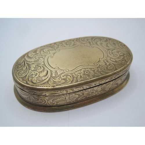 265 - A gilt brass Go to Bed vesta case of oval shape with foliate engraving, the interior lined with red ... 