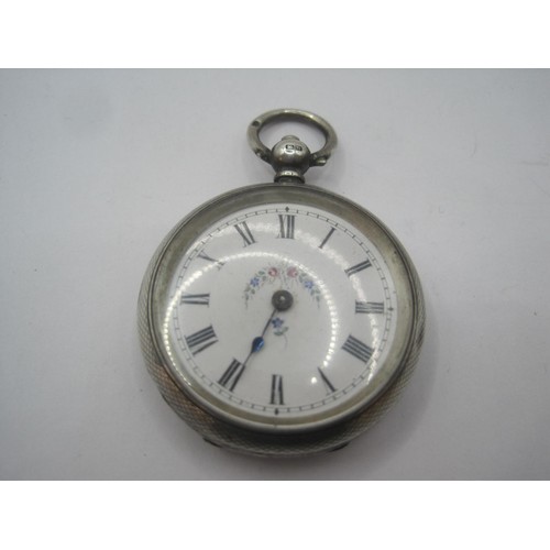 266 - A silver ladies pocket watch with foliate enamel dial and engine turning, key winding. The case with... 