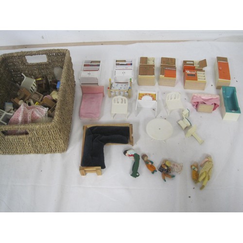 272 - A Lundby dolls house with garage unit, a large quantity of furniture and accessories, several dolls ... 