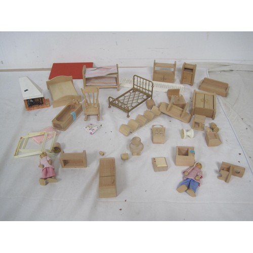 272 - A Lundby dolls house with garage unit, a large quantity of furniture and accessories, several dolls ... 