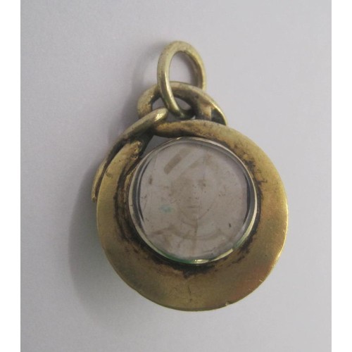 271 - An interesting Victorian yellow metal sweetheart pendant with a military connection. The pendant, fo... 