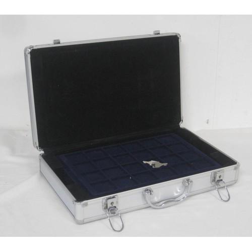 244 - A coin case with five insert trays and two keys. Dimensions of case about 40cm x 24cm x 9.5cm