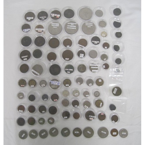 244A - A collection of about eighty-five coins, many of which are contained in capsules, including British ... 