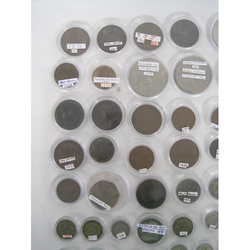 244A - A collection of about eighty-five coins, many of which are contained in capsules, including British ... 