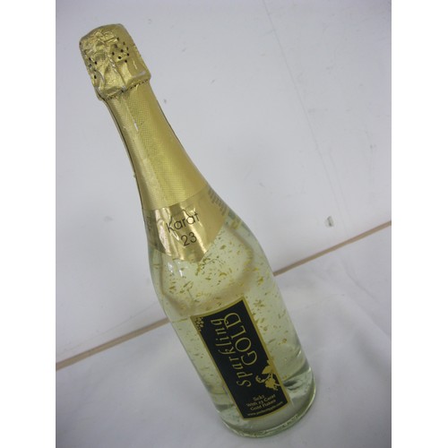 63 - A sealed bottle of Sparkling Gold Sekt with 23 carat gold flakes, make your sewage sparkle this Chri... 