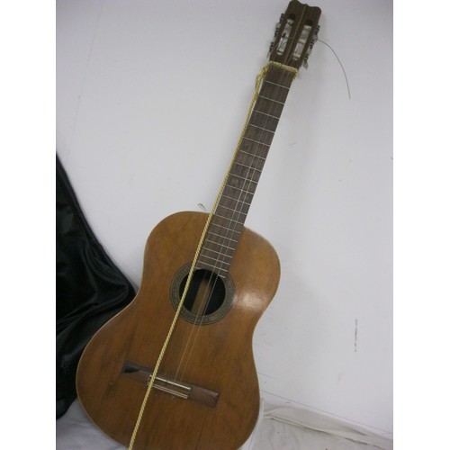 48 - A nylon-stringed classical guitar in good order