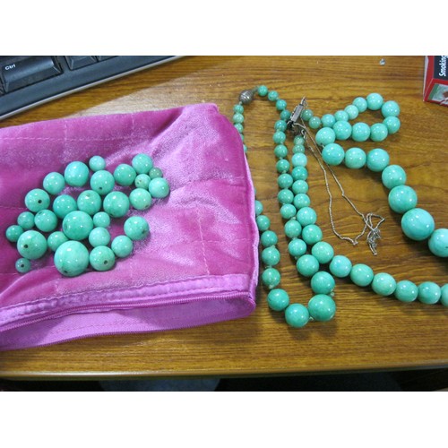 65 - A pair of jadeite necklaces in good order, plus a further set of jadeite beads, unstrung