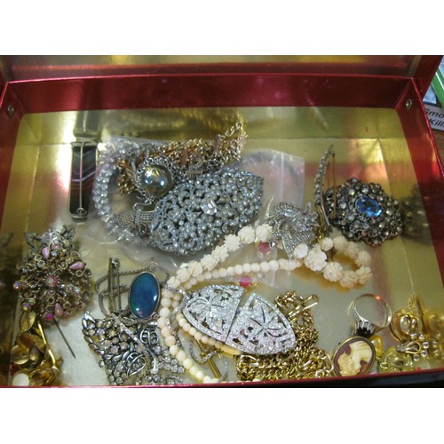 66 - A box of costume jewellery including a silver chain etc