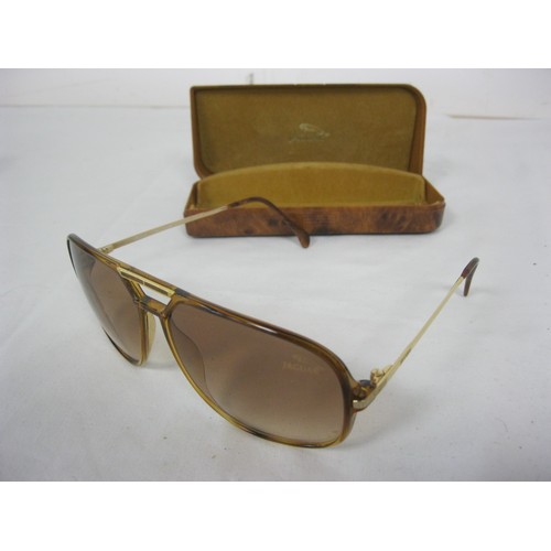 173 - A pair of vintage Jaguar sunglasses in original Jaguar case