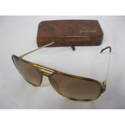 174 - A pair of vintage Jaguar sunglasses in original Jaguar case