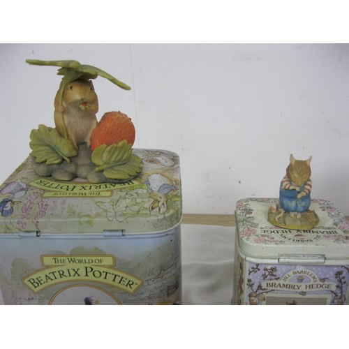 58 - A selection of Frederick Warne Beatrix Potter figures and a Poole Pottery vase, plus a Brambly Hedge... 