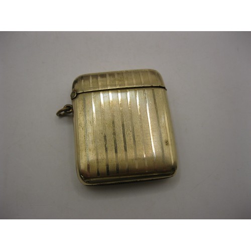 76 - A gold-plated vesta of traditional shape with engine turned bands, inner edge stamped ROLLED GOLD SP... 