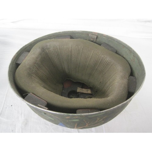 270 - A 1983 dated tank or paratroop helmet with padded liner, by RM Ltd, with camouflage paint applied, i... 