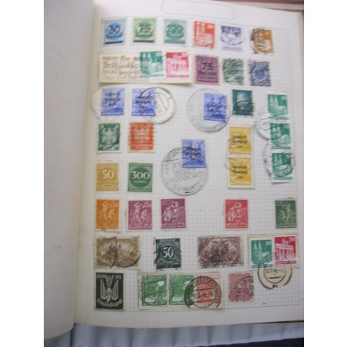 69 - A pair of stamp albums and a box of mixed stamps