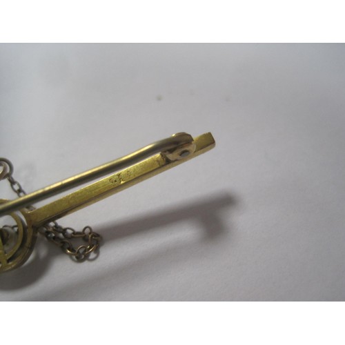 200 - A yellow metal bar brooch with seed pearl mounted to centre, acid tests as 9 carat, safety chain, wo... 