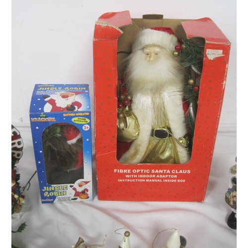 247 - An assortment of animated Xmas figures and scenes, some boxed and apparently new old stock