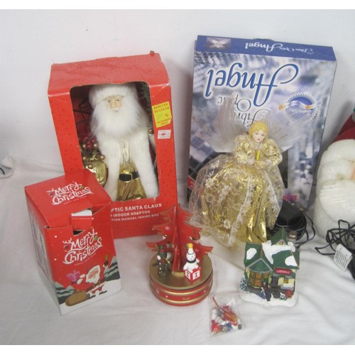 248 - An assortment of animated Xmas figures and scenes, some boxed and apparently new old stock